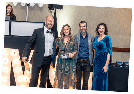 leadership team at award ceremony